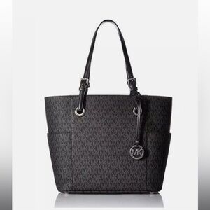 NEW NEVER USED Michael Kors Jet Set Black silver hardware EastWest Signature Bag